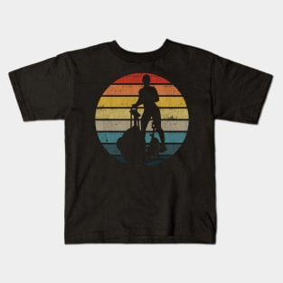 Exercise Bike Silhouette On A Distressed Retro Sunset product Kids T-Shirt